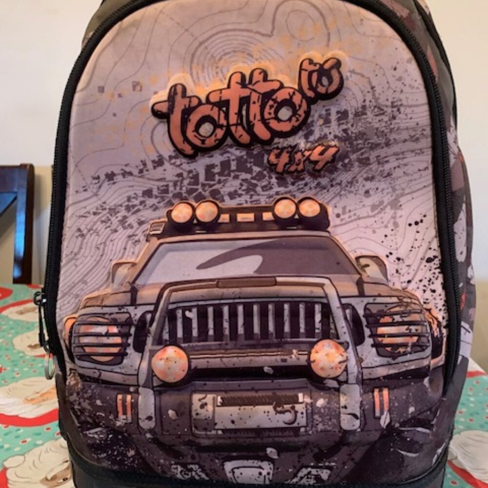 Very Cool TOTTO 4 X 4 Camo Backpack, with wheels and extending handle